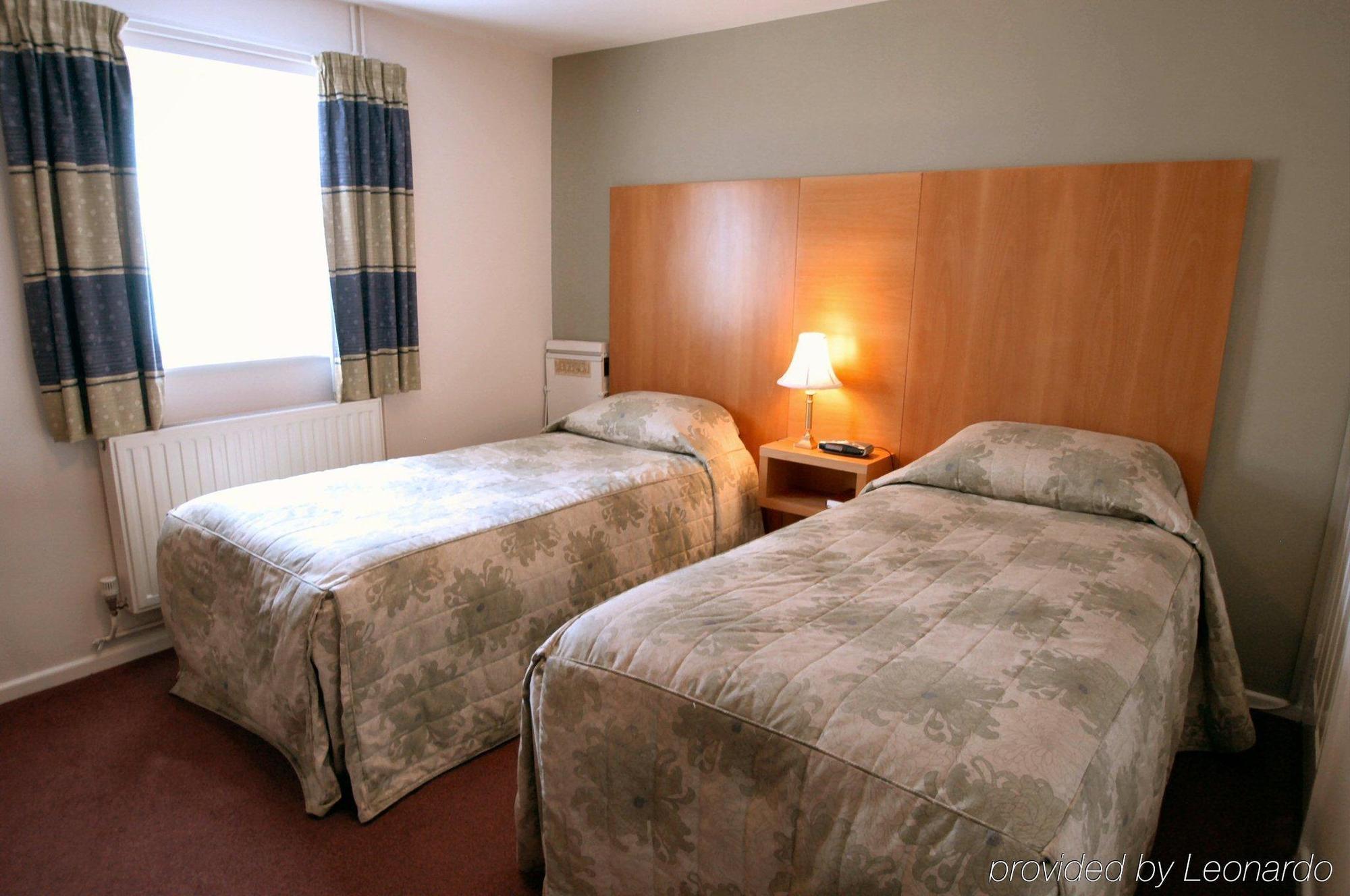 Coach House Hotel Melbourn Habitación foto